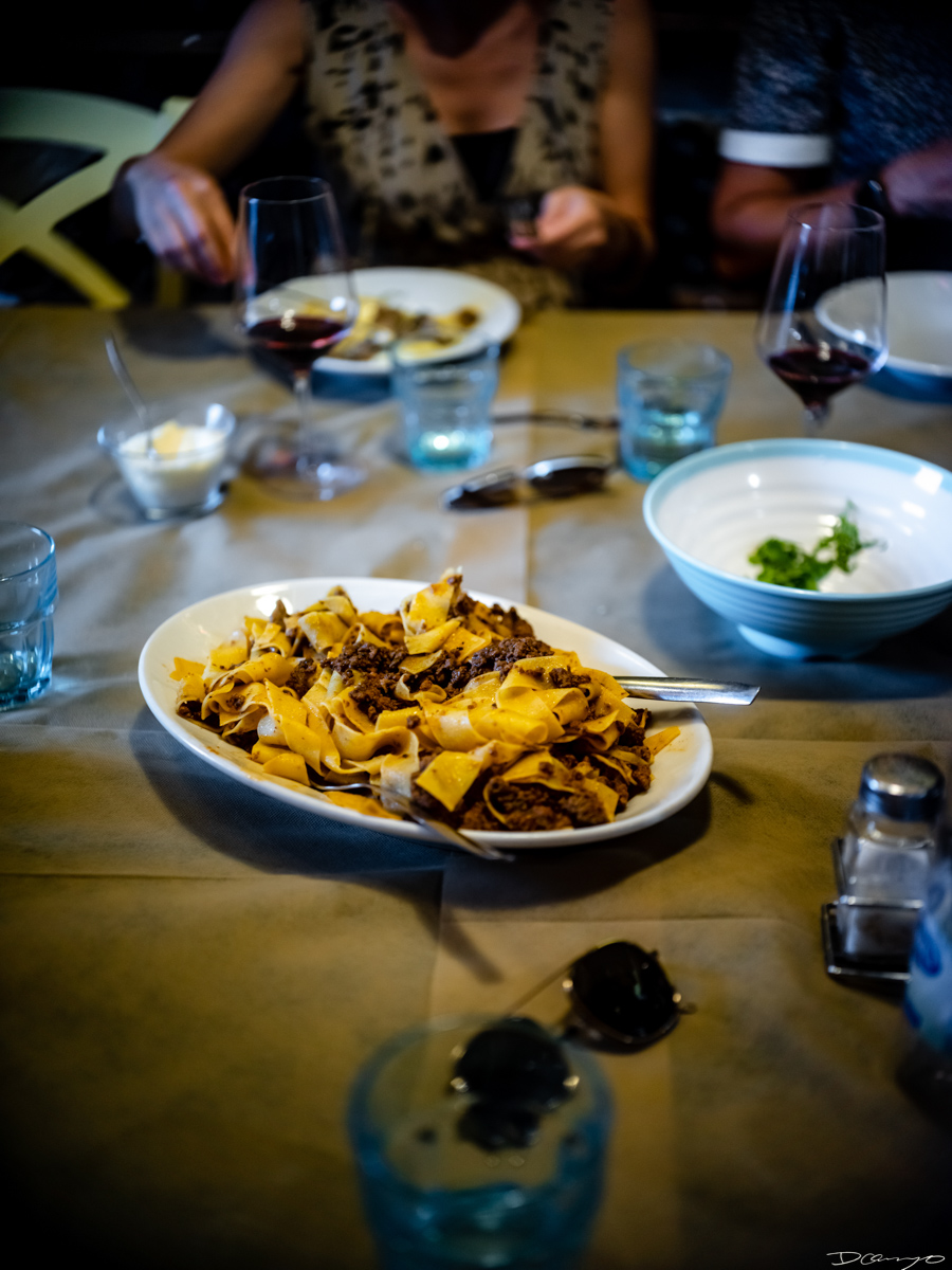 Photos from a trip through Italy in Summer of 2023. Locations include Rome, Florence, Tuscany, Castello di Bossi in Chianti, Siena, San Gimignano, Sirmione on Lake Garda, Bologna, Gudon, Italian Dolomites, Seceda, Cadini di Misurina, and Venice.